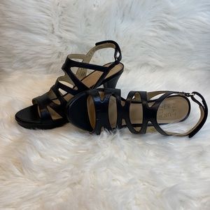 Black leather cutout heels
